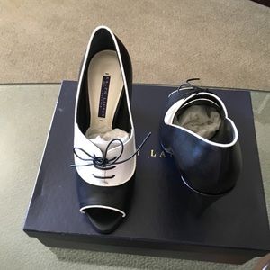 1 pair shoes,approx 4 inches in height, leather.